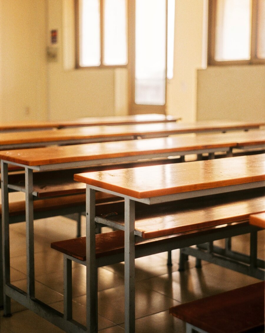 A school hallway and classroom protected by a school surveillance system.