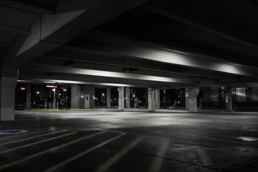 A parking lot structure at night.